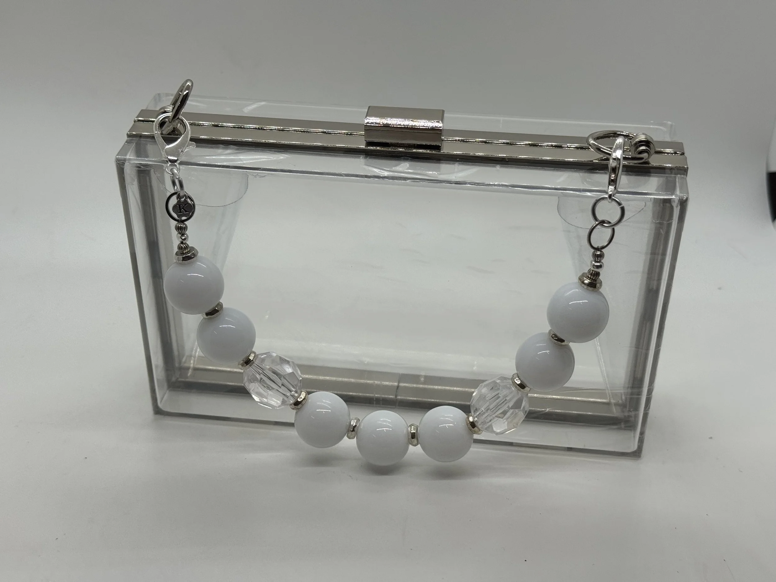 White on White Purse Handle.jpg