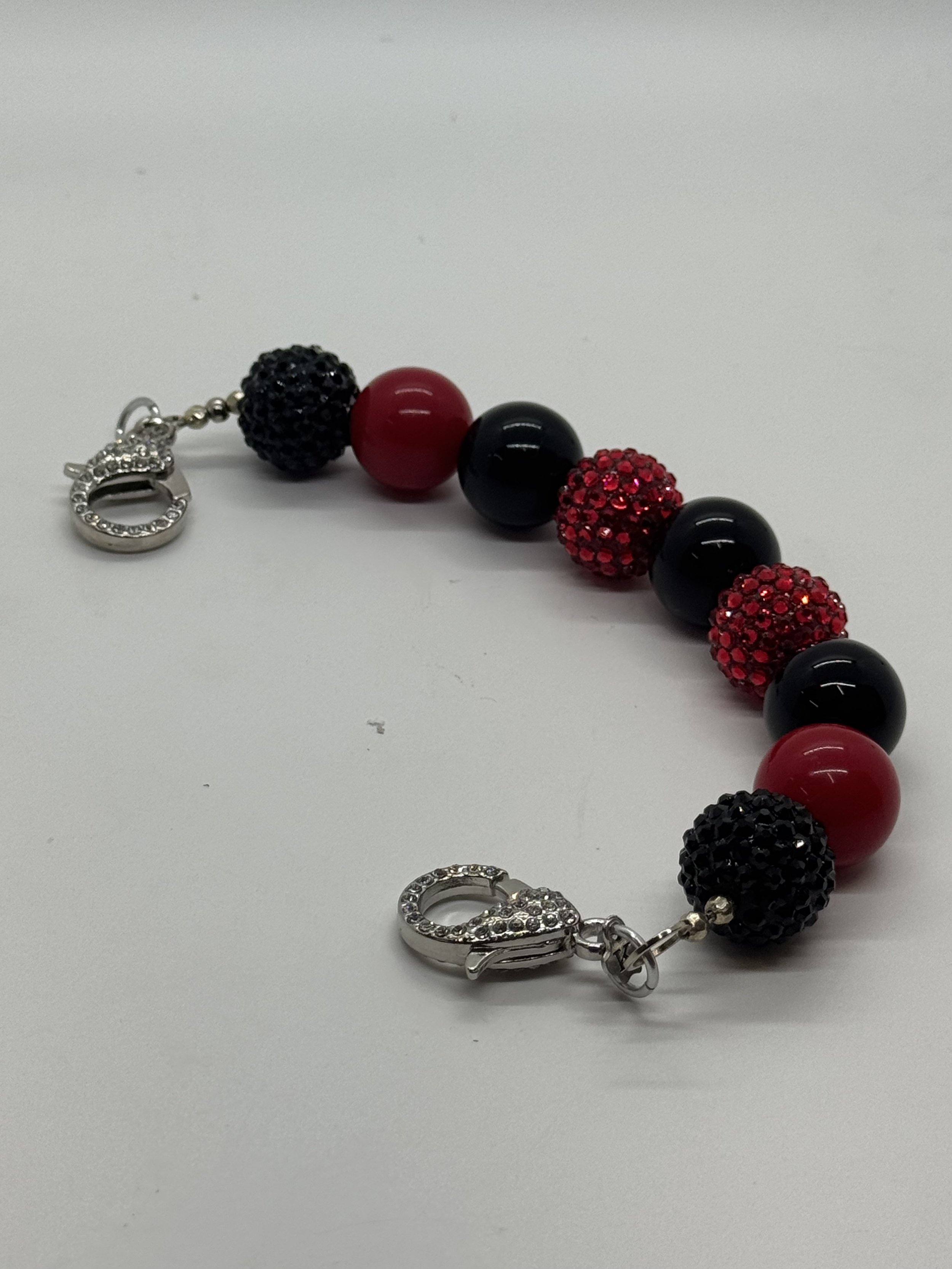 BLACK & READ PAVE BUBBLE BEADED HANDLE.jpg
