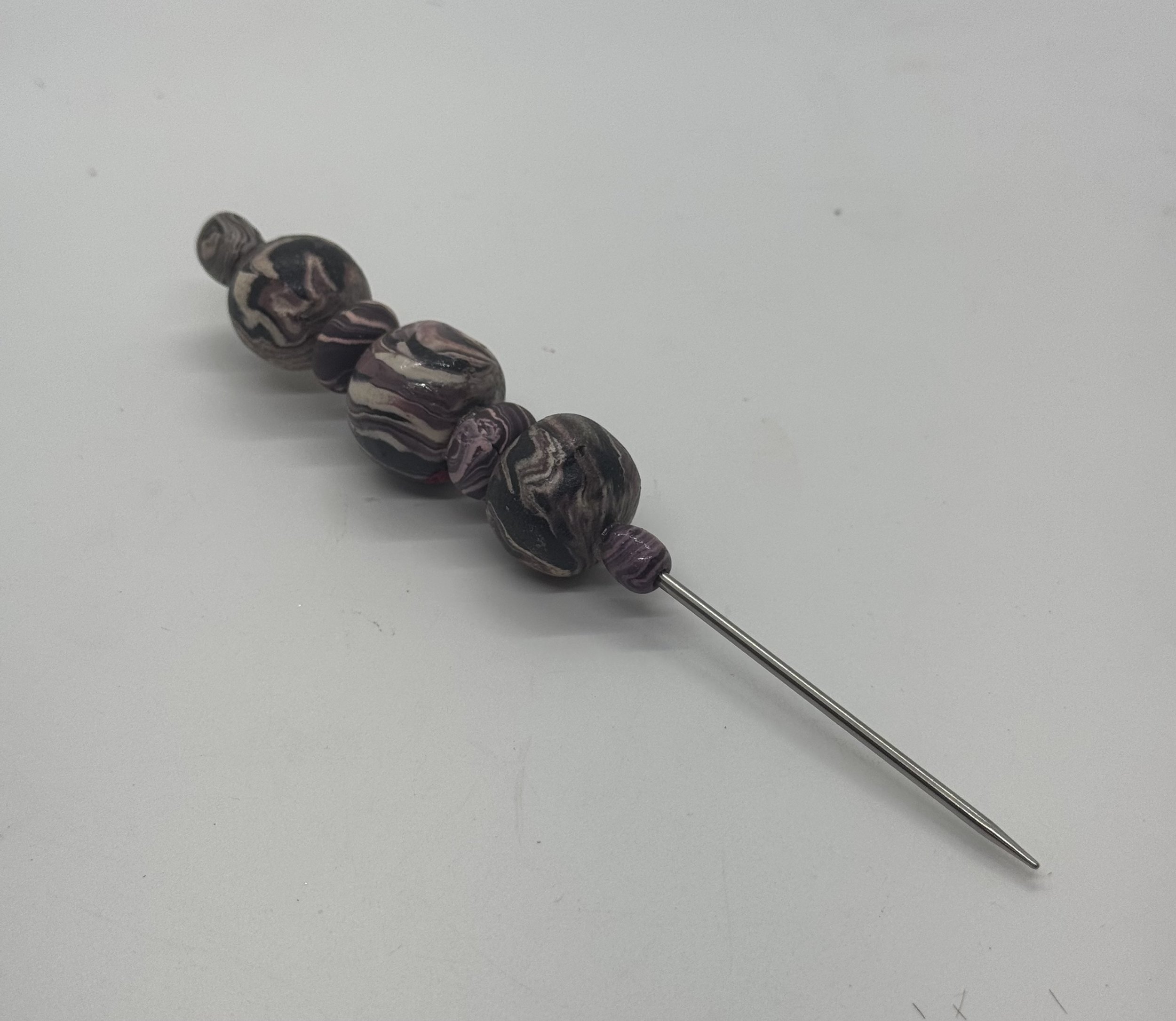 LAYING TOOL - MAUVE SWIRL.jpg