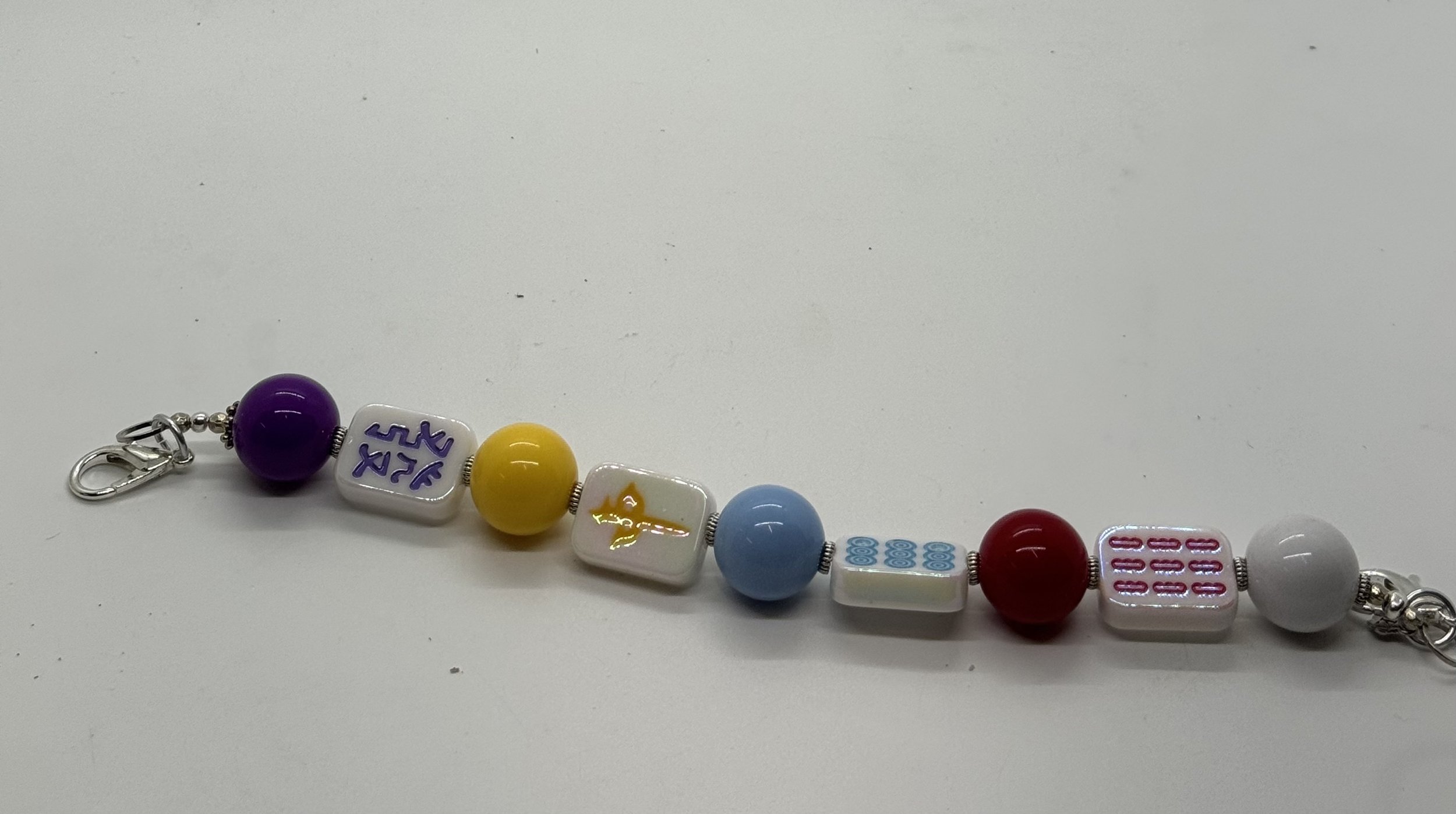 Mahjong Beads from Purple to white.jpg