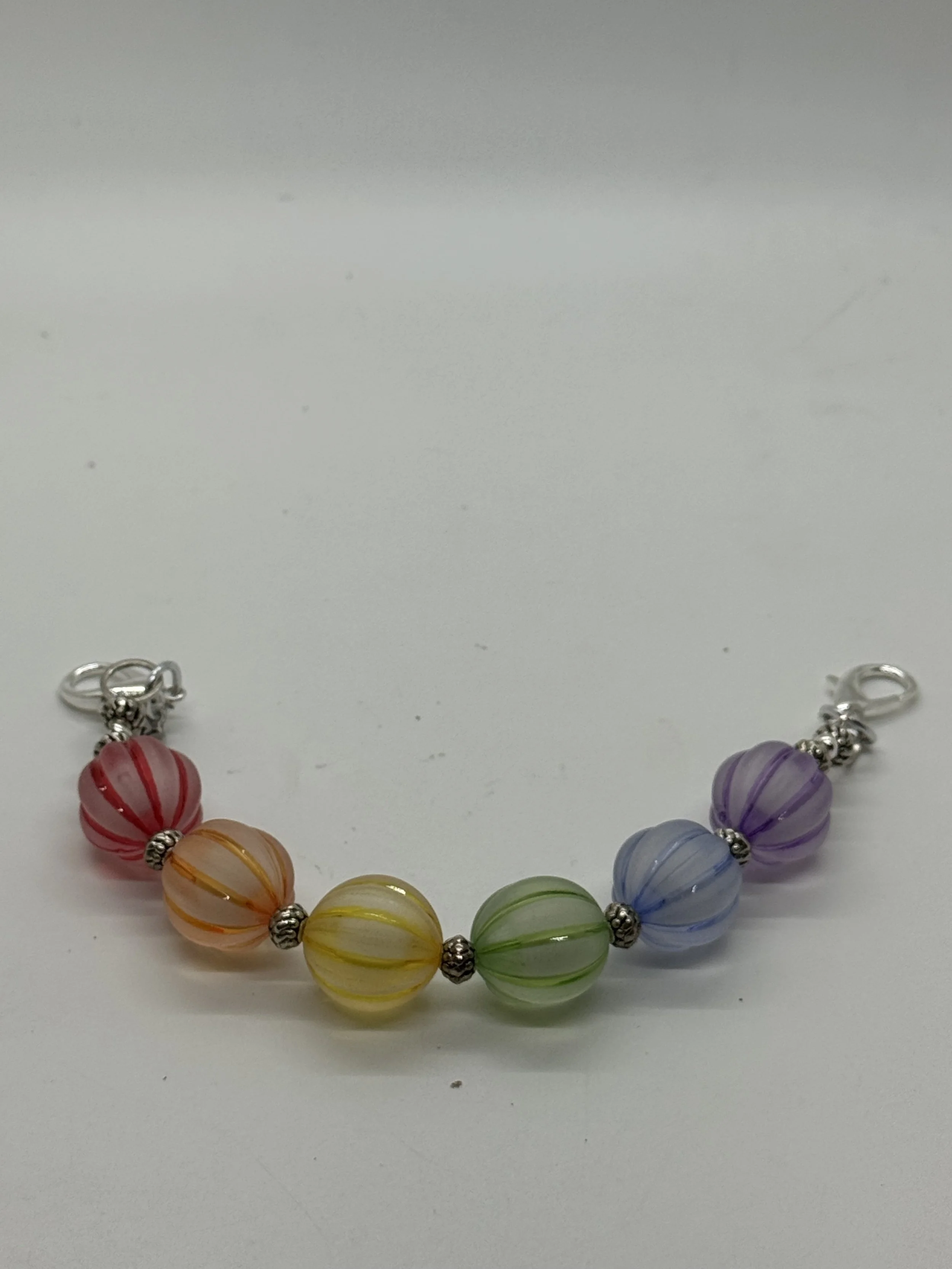 Rainbow Melon Bead Clutch Handle.jpg
