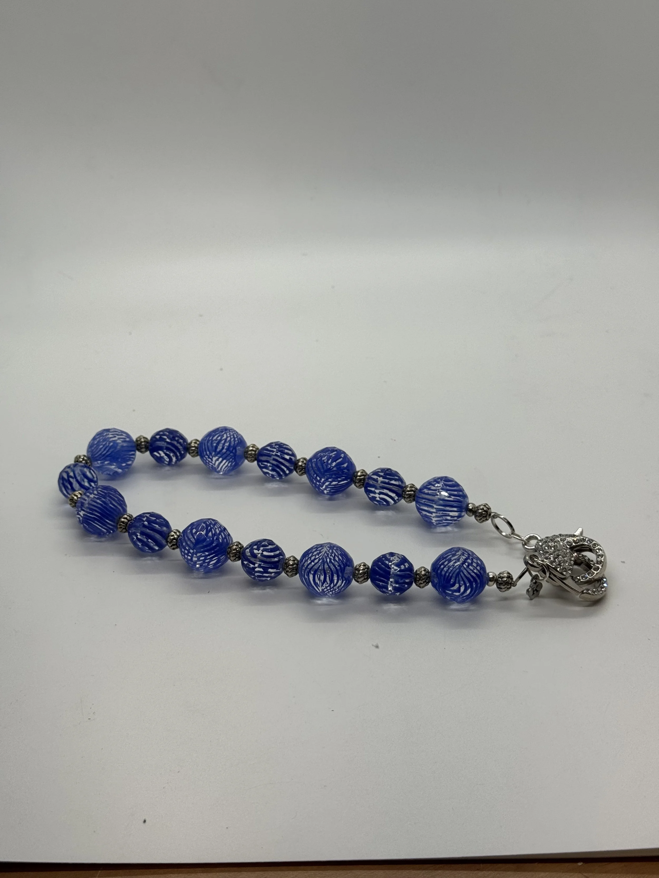 BLUE CRYSTAL BEADED HANDLE.jpg