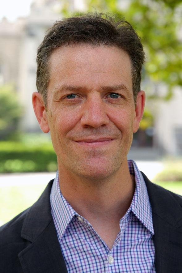 A white man with short brown hair