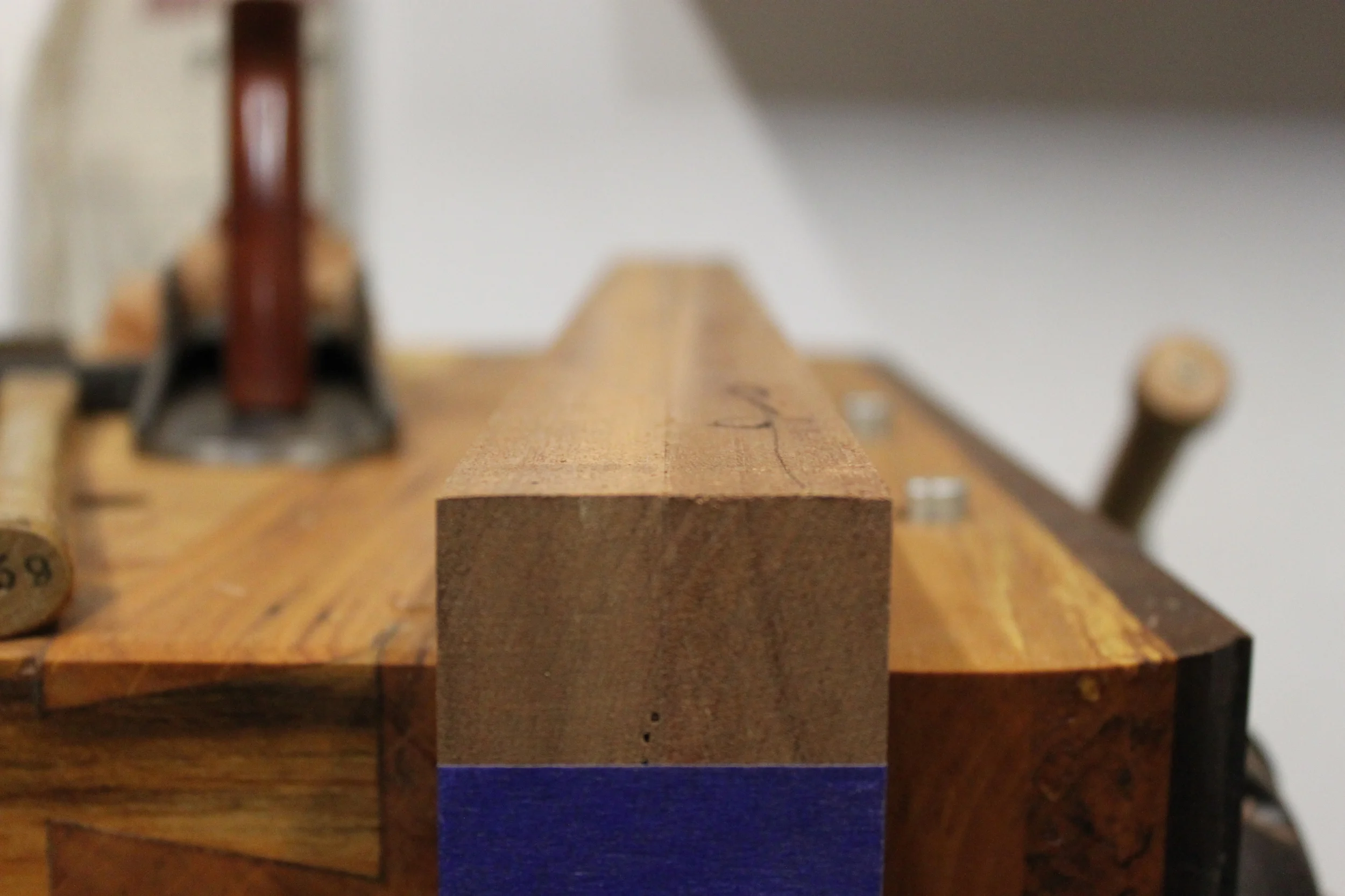 If you're having trouble, planing mating edges together can help. It makes the planing surface wider and also minimizes the chance for errors. Another tip is to tape the pieces together using blue painter's tape so they don't move around when mounting in the vise. 