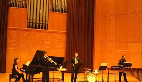 Photo of Dr. Paul Forsyth and me performing at Northwestern State University. 