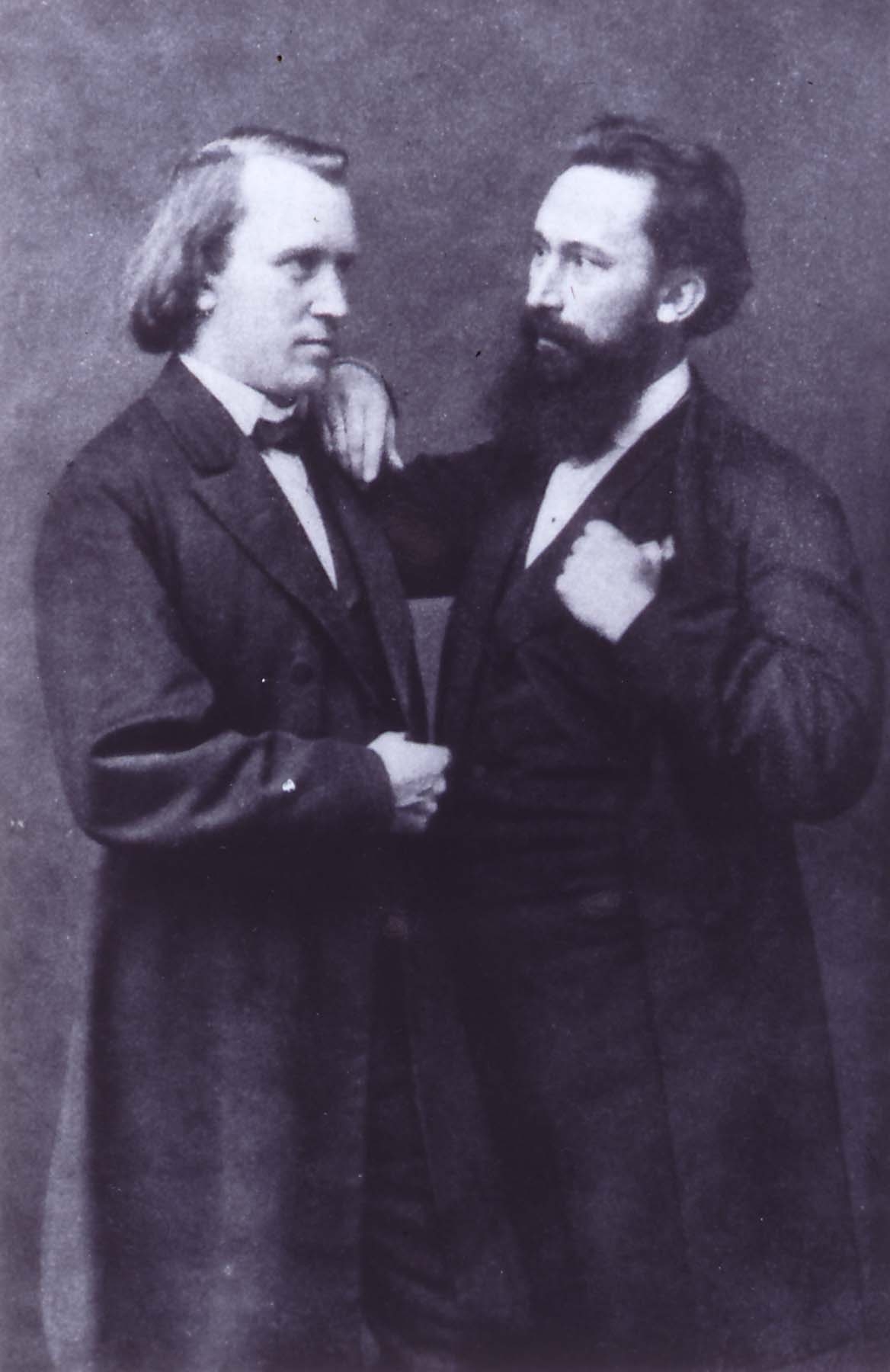 Johannes Brahms & his friend Julius Stockhausen circa 1870. Stockhausen performed as the baritone soloist in both the successful 1868 performance of Ein deutchses Requiem in Bremen (in German) and in the 1871 London performance (in English). Stockhausen also was appointed music director of the Hamburg Philharmonic over Brahms. 