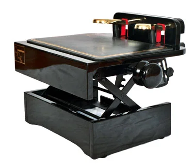  A pedal extender allows young pianists to use the pedals from a high sitting position, while avoiding the habit of curling the legs around the piano stool. 
