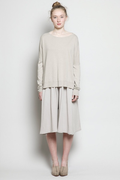 Croation born designer Damir Doma grew up in Germany and studied fashion in Munich and Berlin, graduating in 2004 with honors for best student collection. Damir worked for Raf Simons and Dirk Schoenberger in Antwerp before launching his own label in 2006. Described as being a poetic and intellectual take on contemporary women's and menswear. Renouncing decorative elements, Doma's inspiration is the purity and peaceful state of being freed of thoughts, noise and distraction.