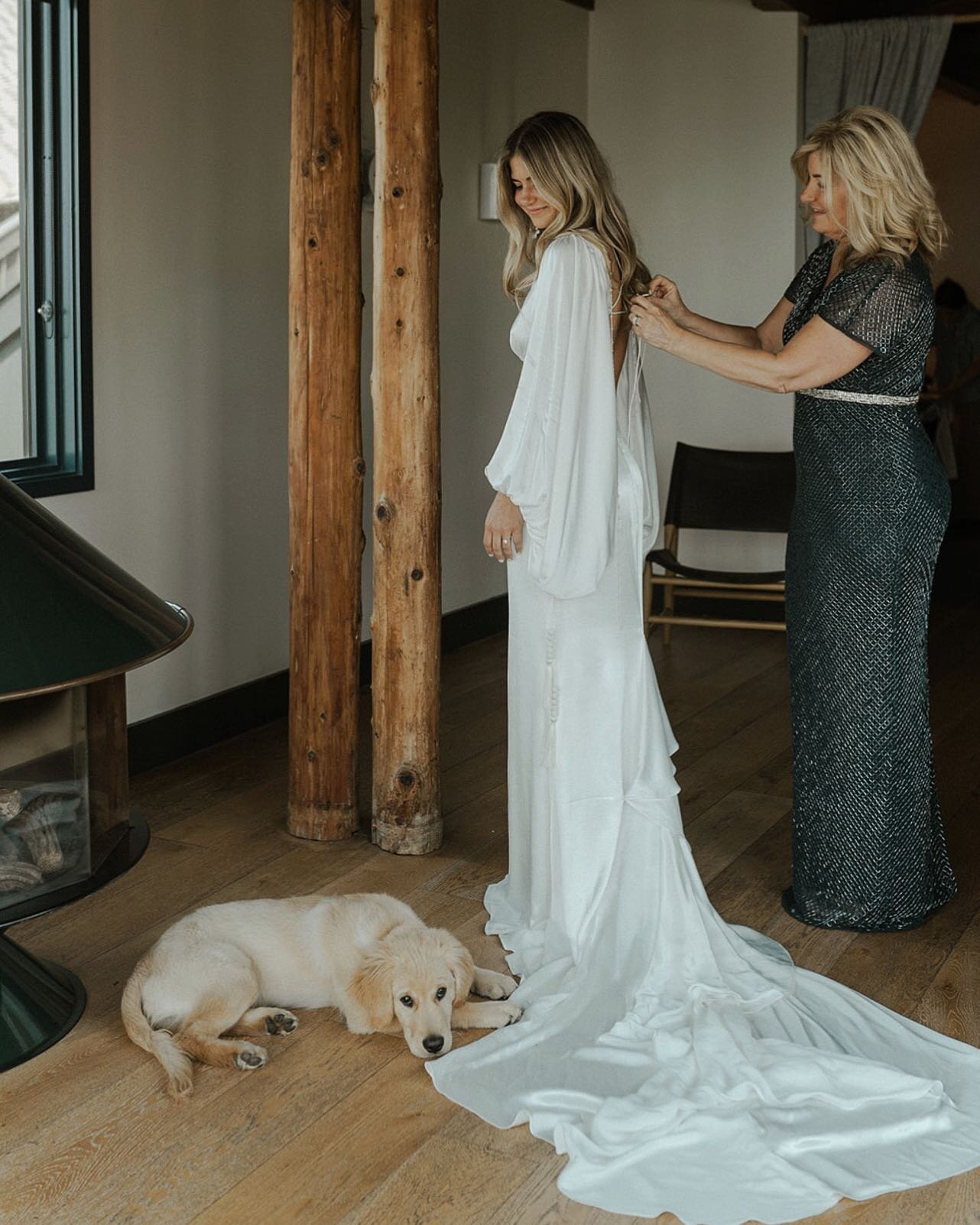 I don&rsquo;t think Christine and Ty could have had a cuter ring bearer escort, Oak melted all our hearts, especially mine during this sweet moment he laid next to his mom putting on her gown.