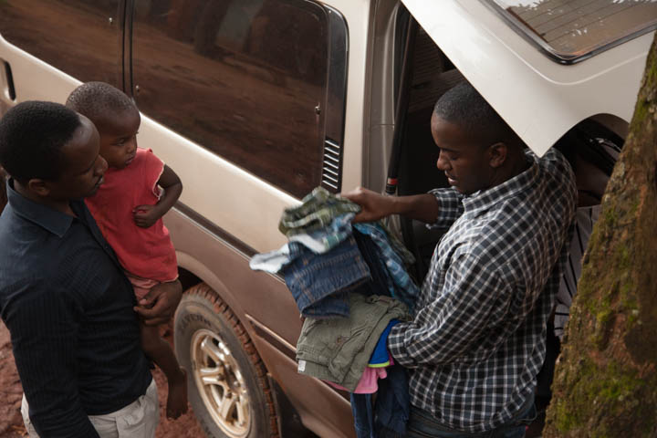 Godfrey distributing clothes.jpg