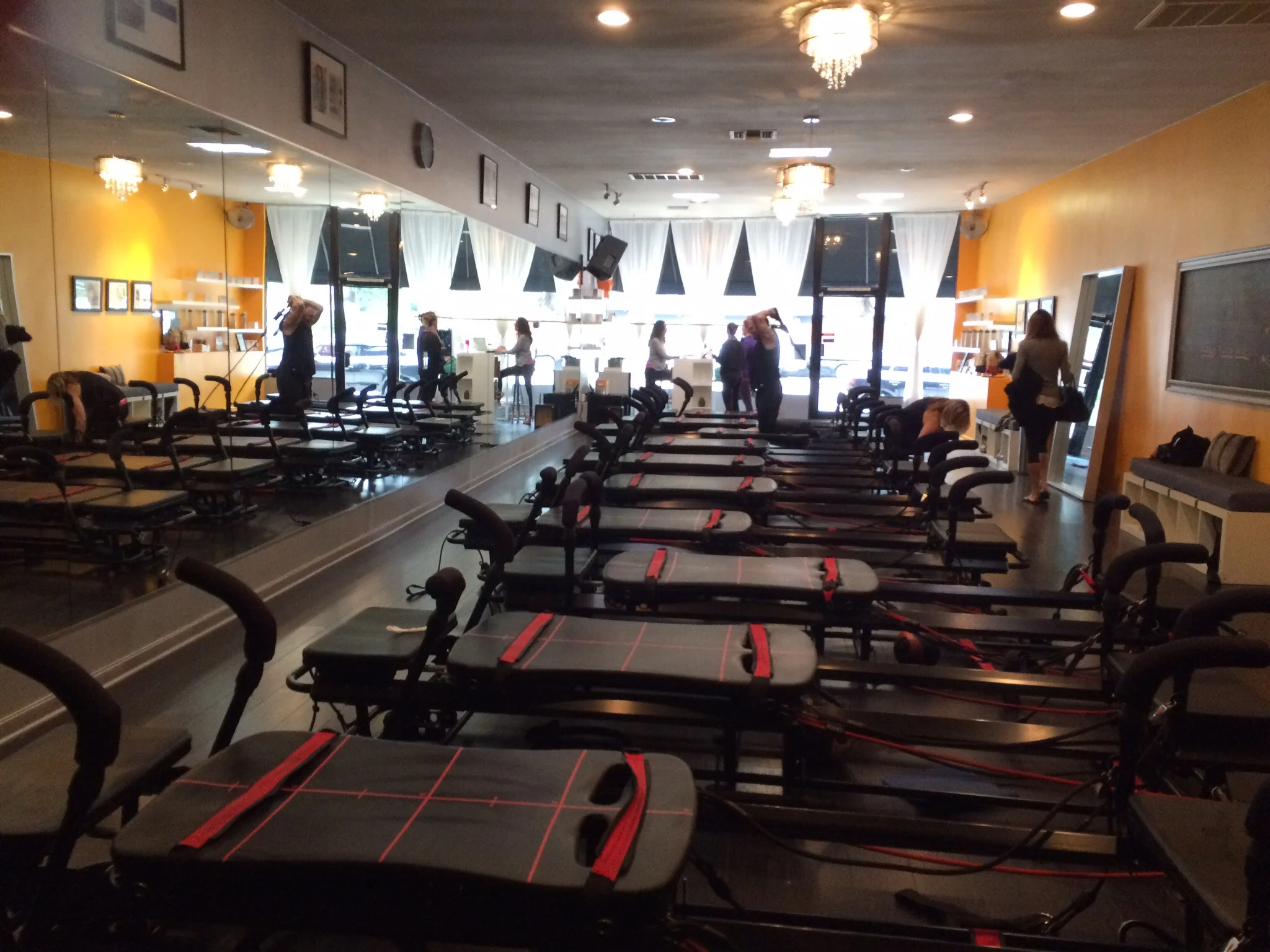 The Studio, on the other side is a wall with TRX hanging from the ceiling