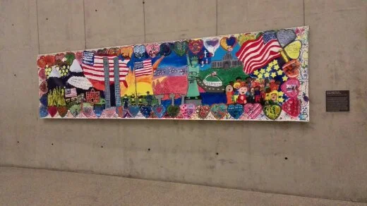 Mural created for the people of New York from the students of the Porter Gaud Lower School in Charleston, South Carolina. Years later, its creators learned that their mural had enlivened a wall in the children's area of the Family Assistance Centre established by New York City to aid relatives of the 9/11 victims.
