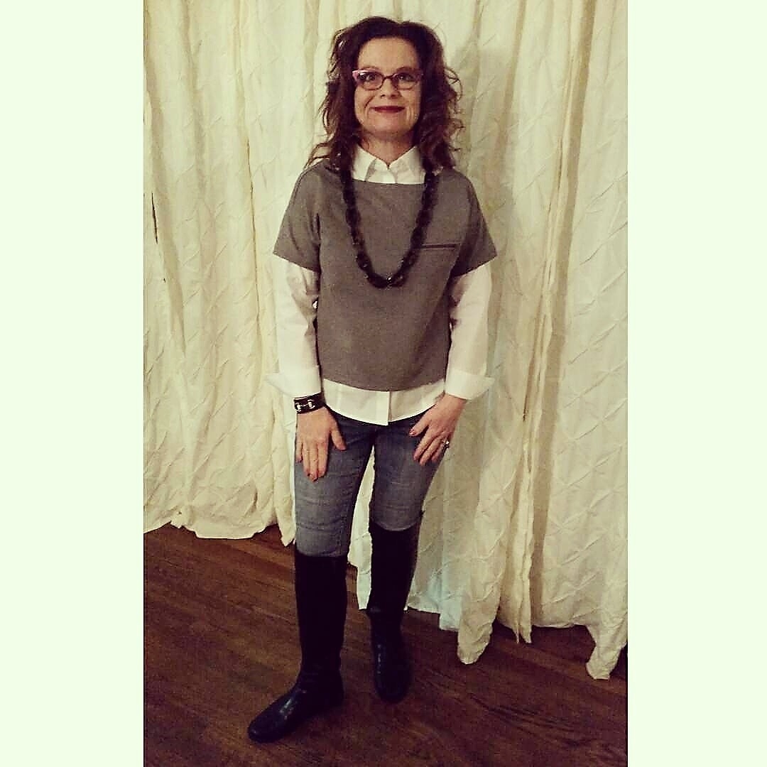 This is a crop top from Banana Republic. For me, layered with a white shirt, jeggings, and boots I think this is age-appropriate for me at 53. The shirt hits at a place that not only is appropriate for the midriff, but makes the jeggings work as well. If I were a 20something I might wear this without the blouse, high-waisted skinny skinny jeans and the boots. 