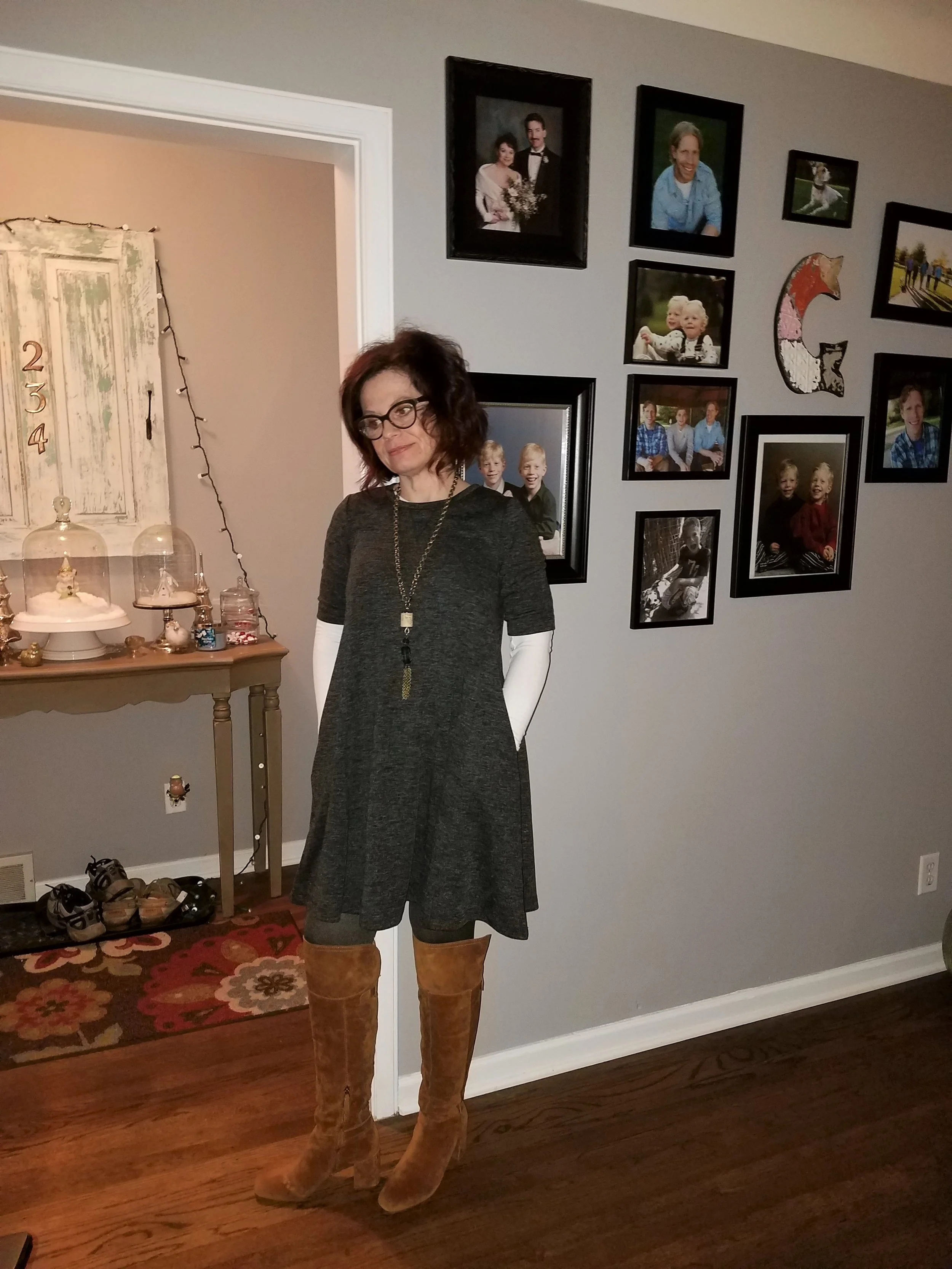 This is a short, A-line dress from Andrea Jovine that I purchased recently at TJ Maxx for less than 30 bucks! I wear opaque tights and over the knee boots with it. I would not wear a dress this short without opaque tights. In the spring I may pair this with a pair of cropped leggings and flats or booties. A woman under 30 I feel, could wear this shorter length with bare legs and make it look great. 