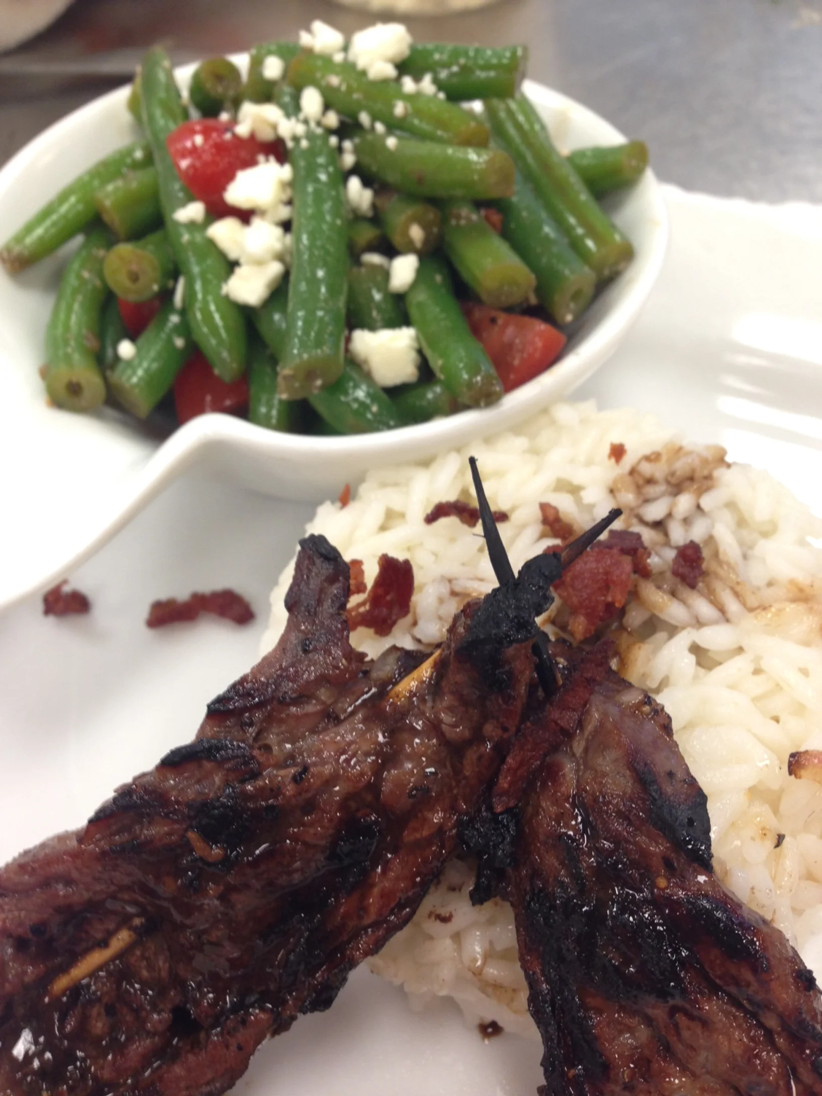 Grilling Week! Grilled flank steak, bacon balsamic reduction, green bean feta salad.