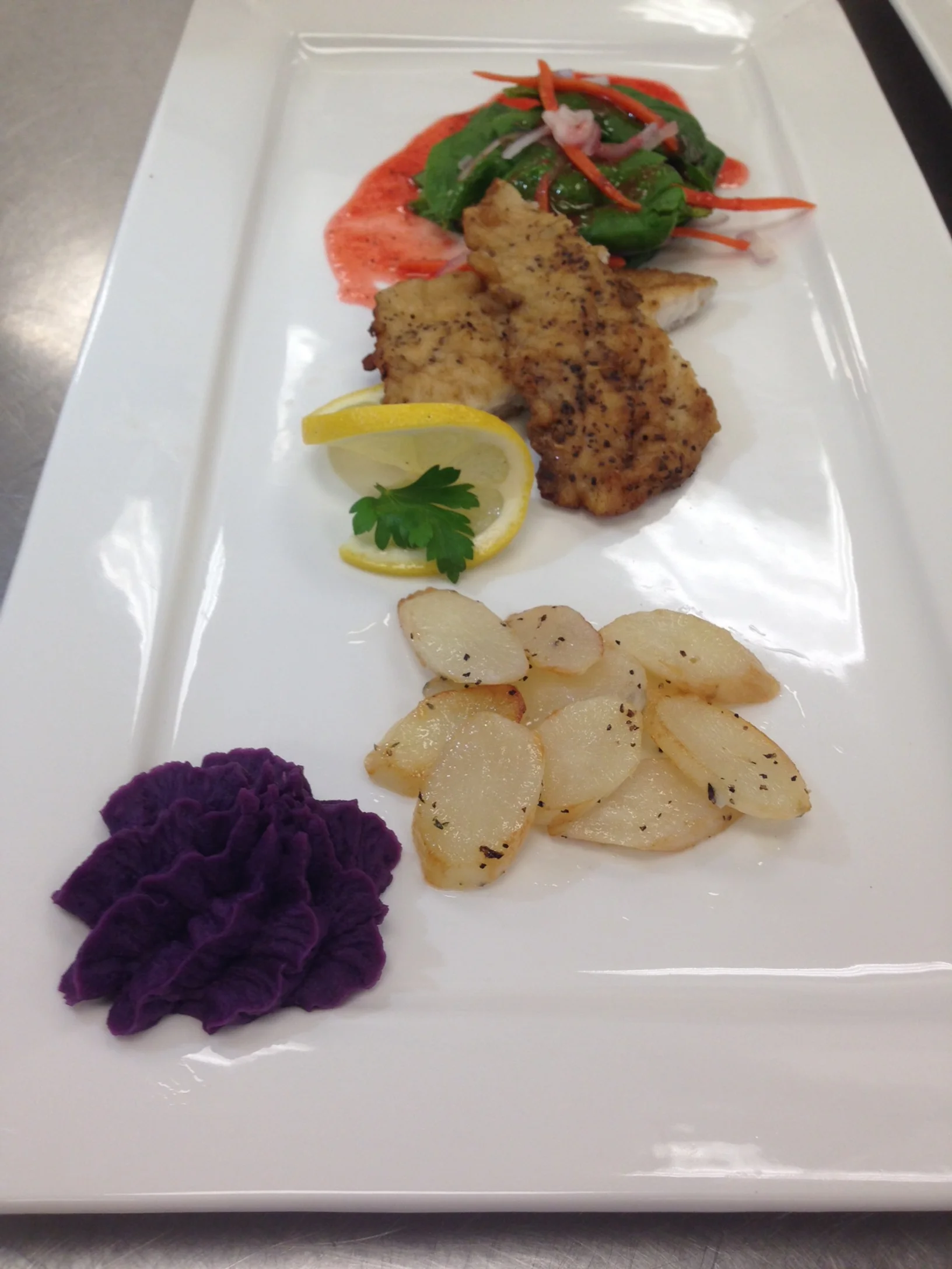 Fish week! Seared trout,strawberry spinach salad, caramelized salsify, purple sweet potato puree.