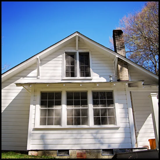 Full repaint and window restoration. House had severe mold and peeling paint. First, we bleached, scrubbed and pressure washed. Next, all peeling paint was removed by scraping, then every square inch of the exterior was sanded and rinsed before hand priming with a slow drying oil primer. Finished with application of Benjamin Moore Aura, a latex-based paint with mildicide .