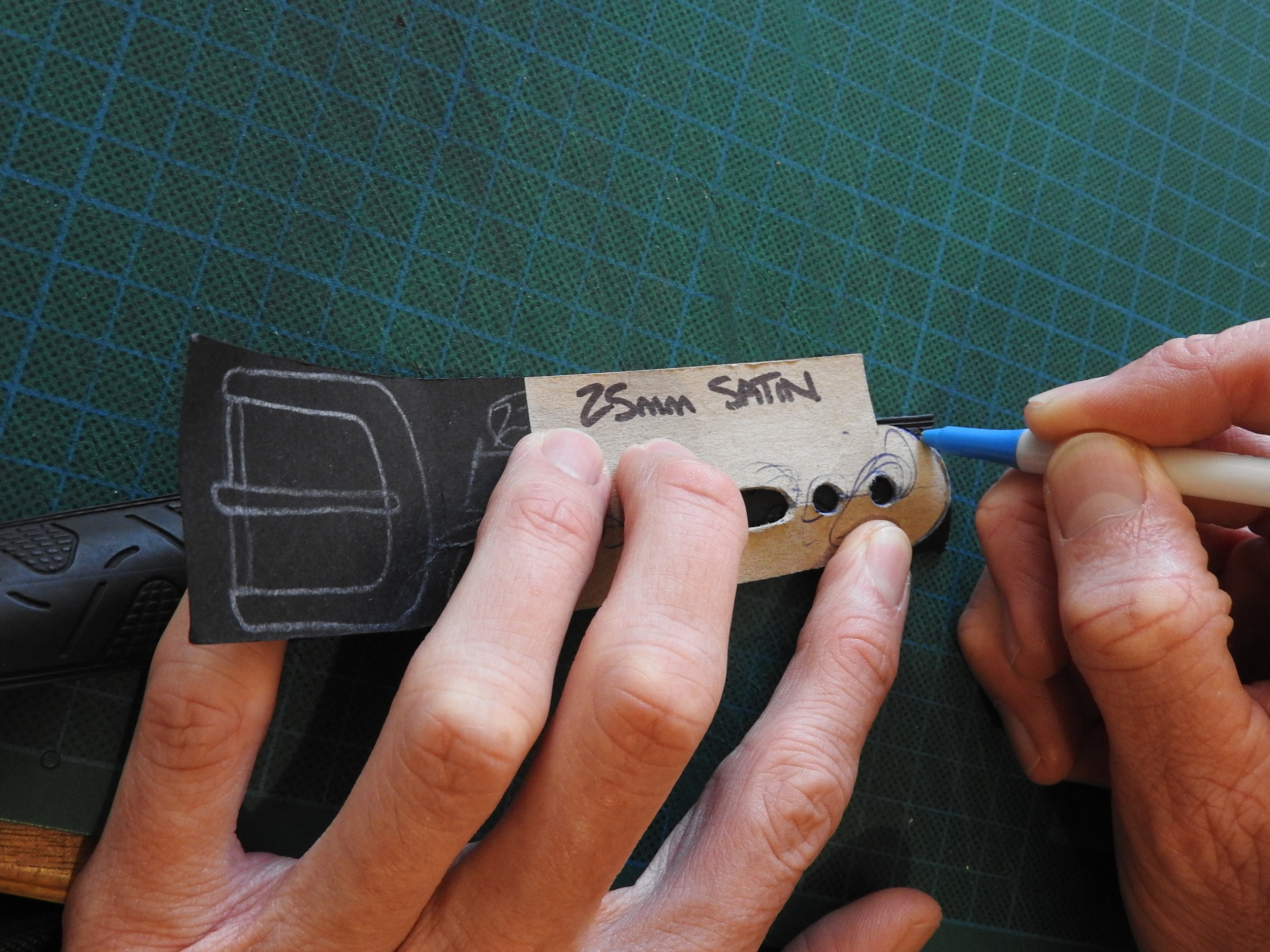 Templates make sure every belt is precisely marked.
