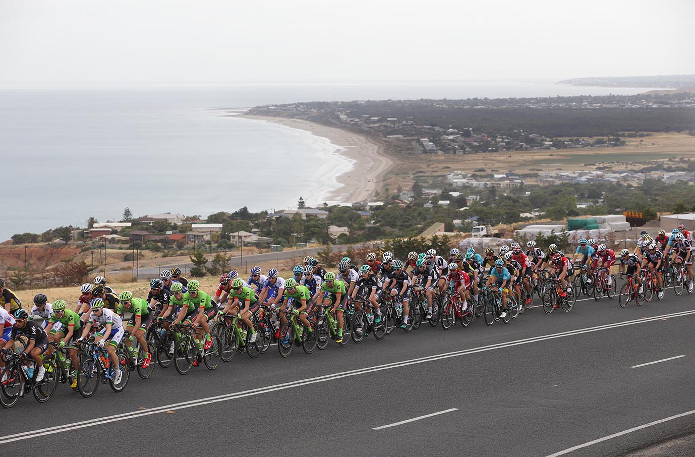 Riders climb Sellicks Hill overlooking Aldinga beach