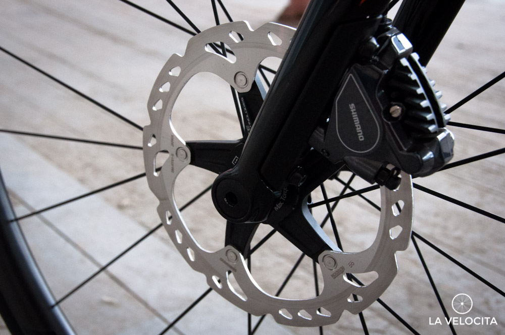 There will be discs but the current uncertainty about racing means there will have to be rim brakes too. 