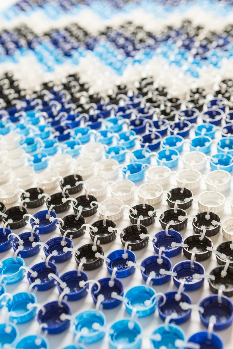 Aunty Cath 2014 Plastic bottle caps & cable ties 110 x 110 x 1cm photographer James Field, courtesy of Adelaide Central School of Art