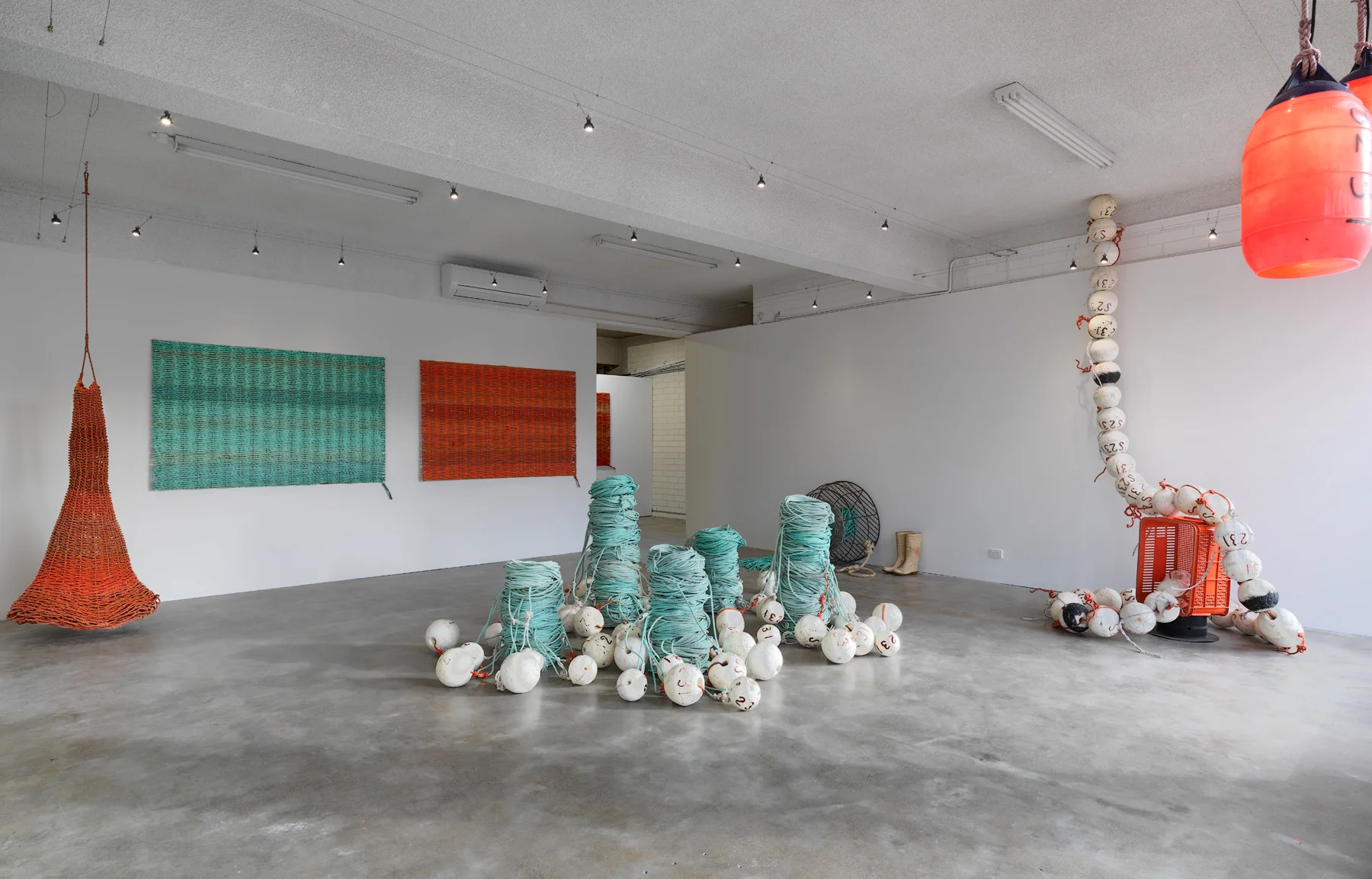 Ode to the fisherman (installation shot) 2016 Discarded lobster ropes, floats, steel and rubber boots photographer Grant Hancock