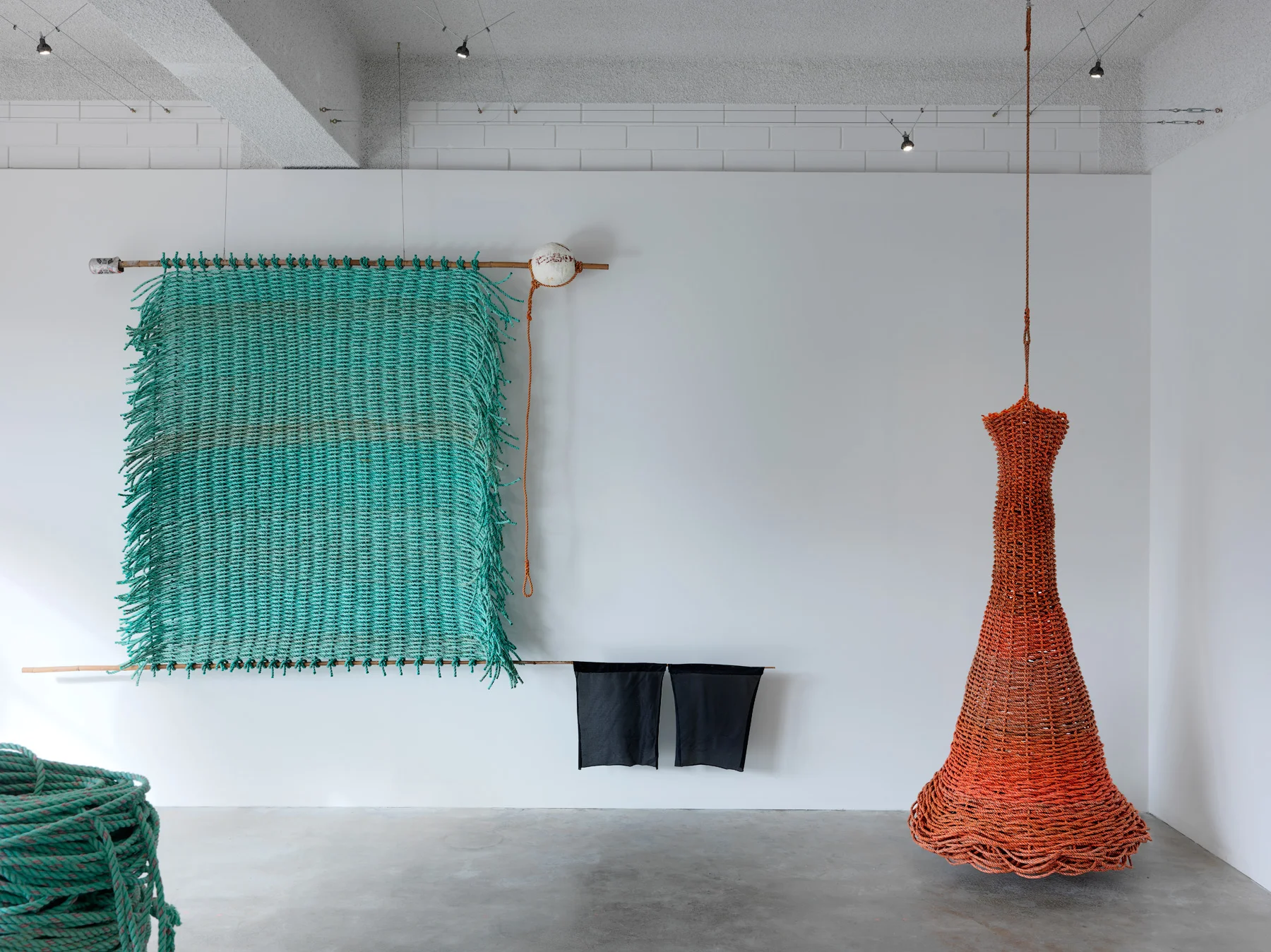 Deep Blue (left) & Snagged (right) 2016 Discarded bamboo, nylon, rope, lead, aluminum can and float Deep Blue - 170 x 315 x 20cm Snagged - 187 x 80 x 80cm photographer Grant Hancock