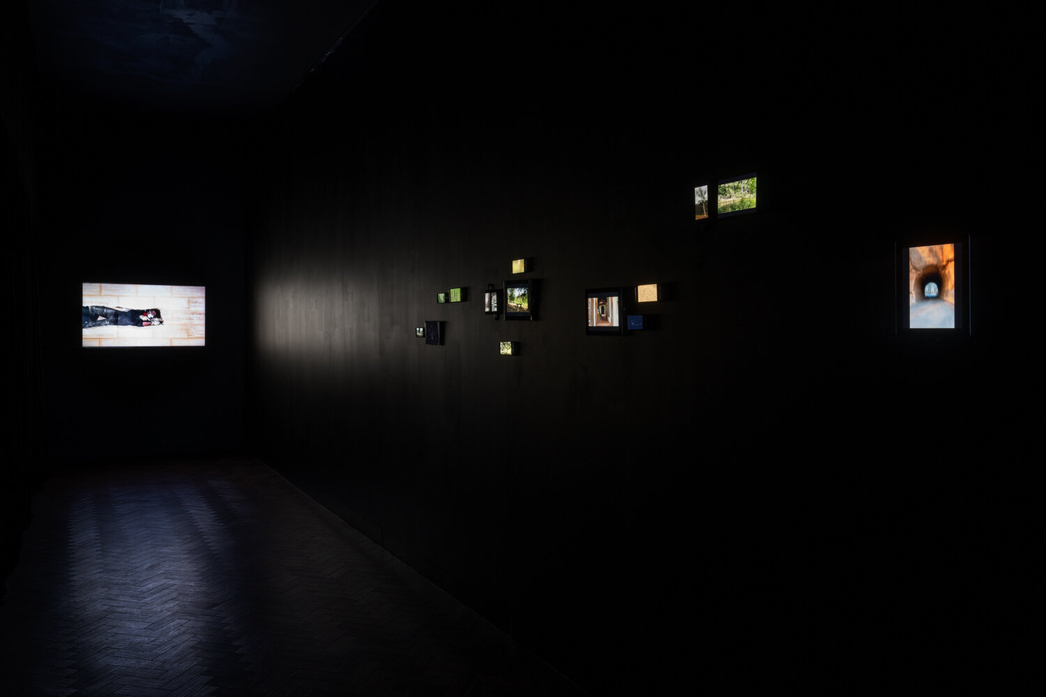  ‘The Tunnel’ (2007-2020). 14 iPads, iPhones, iPod touches and iPad minis looped videos, dimensions variable. Photo: Mark Pokorny.  