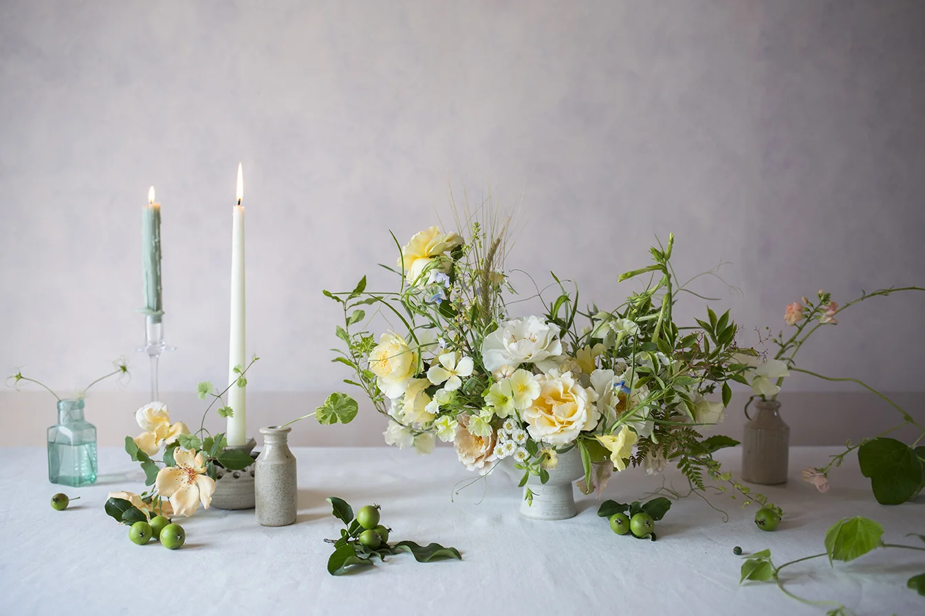 A green and yellow demo flower arrangement made during a workshop at Aesme Flower Studio