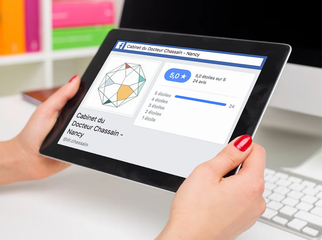 Person in office holding blank screen tablet