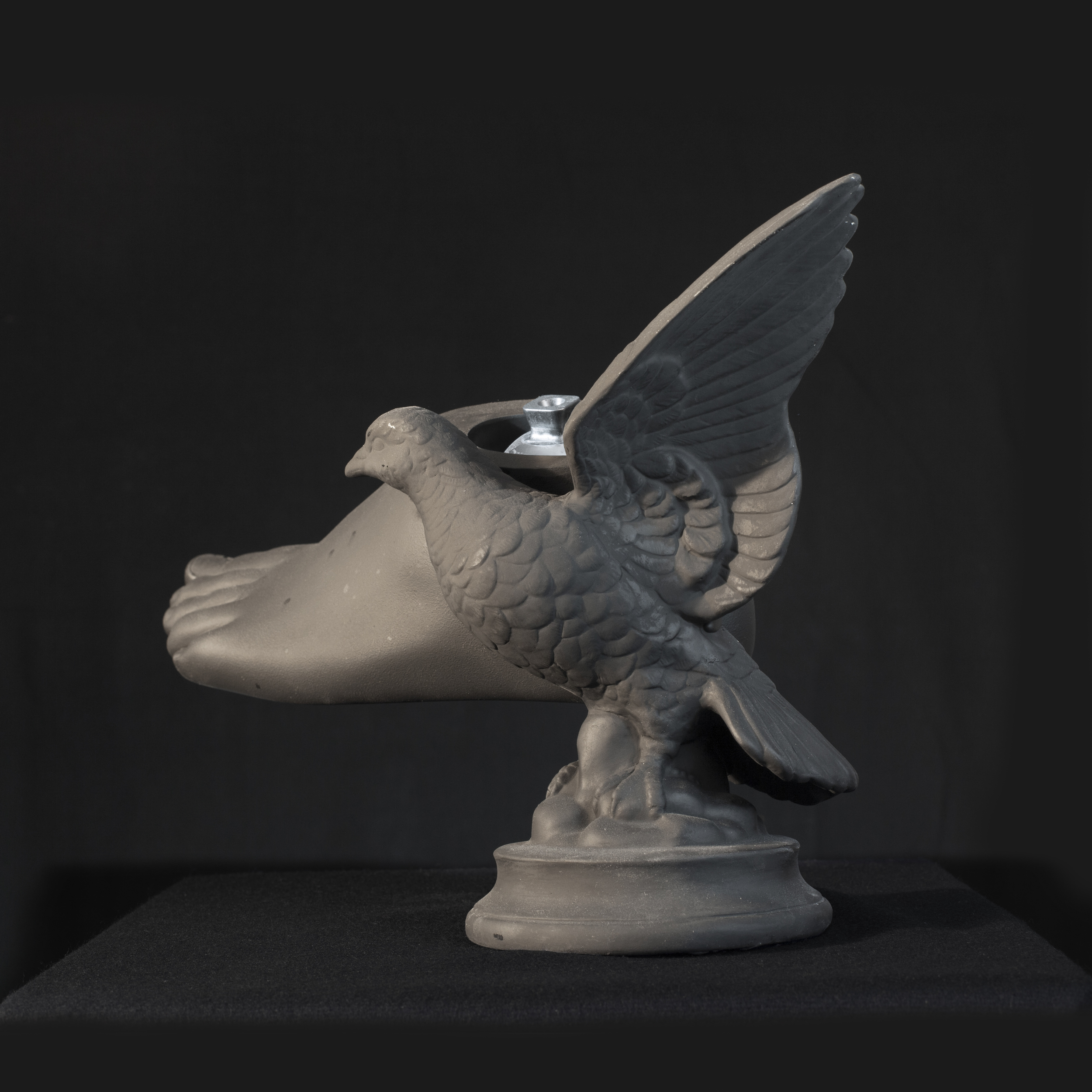 Achilles’ Dove, 2014, painted chalkware and articulated prosthetic, 10x13x6 inches
