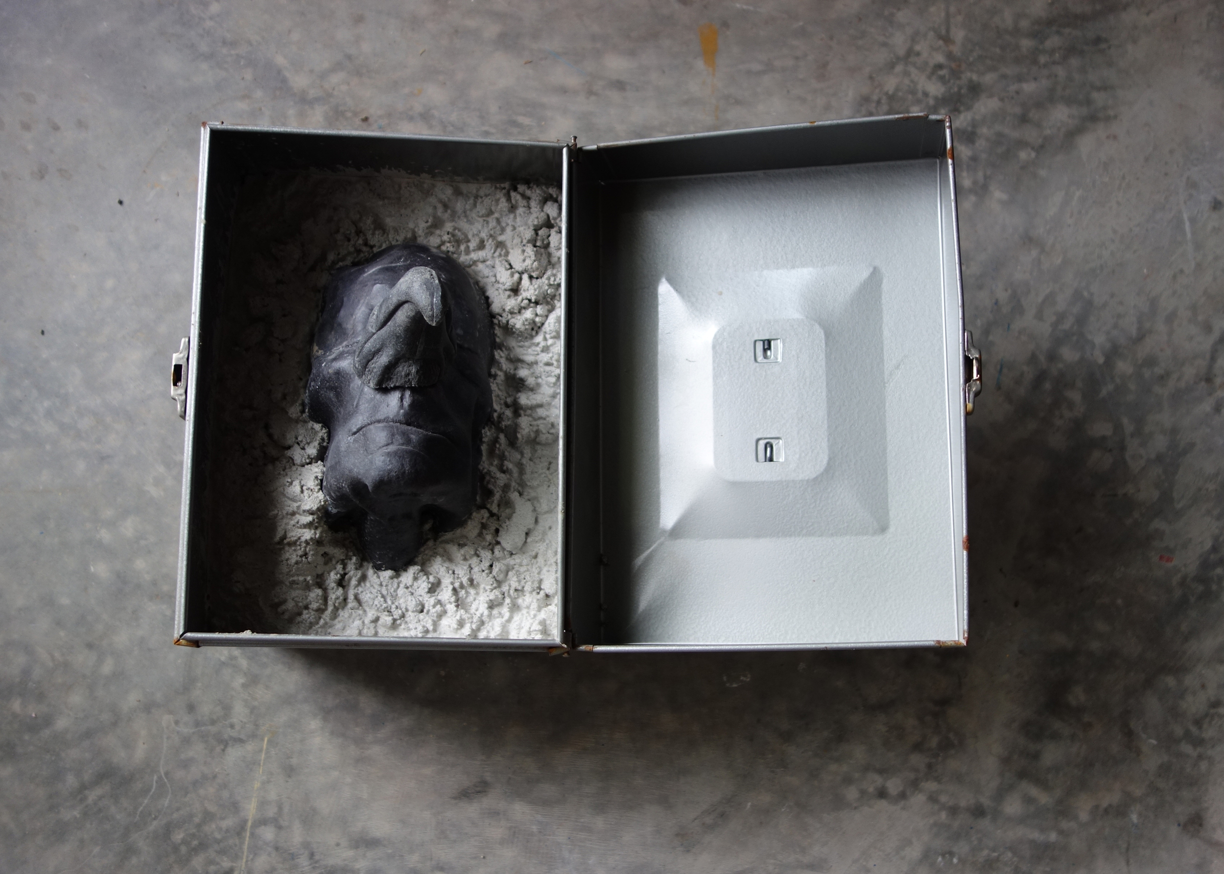RETURN TO SENDER II, 2015, cast cultured granite, cement and metal box 	