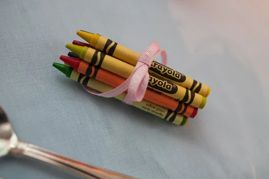 bundle-crayons-kids-table-wrapped-pink-ribbon