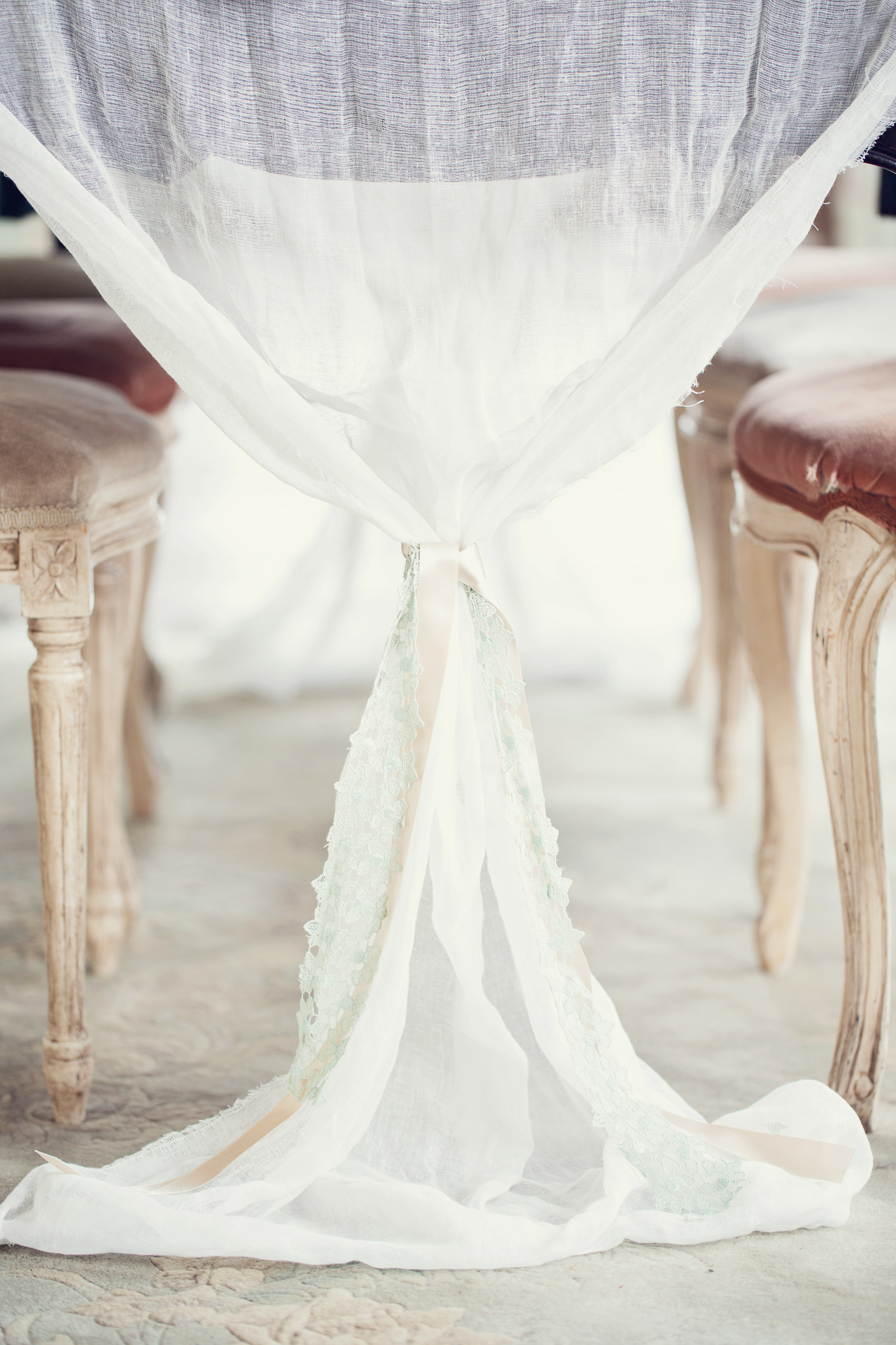 cheesecloth-table-runner-draping-off-table