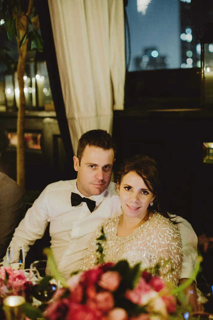gramercy-park-hotel-wedding-magenta-flowers-sophisticated-taper-candles-glamour