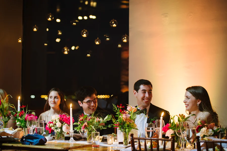 liberty-warehouse-wedding-uplighting-hanging-candles-globes-glass-long-head-table