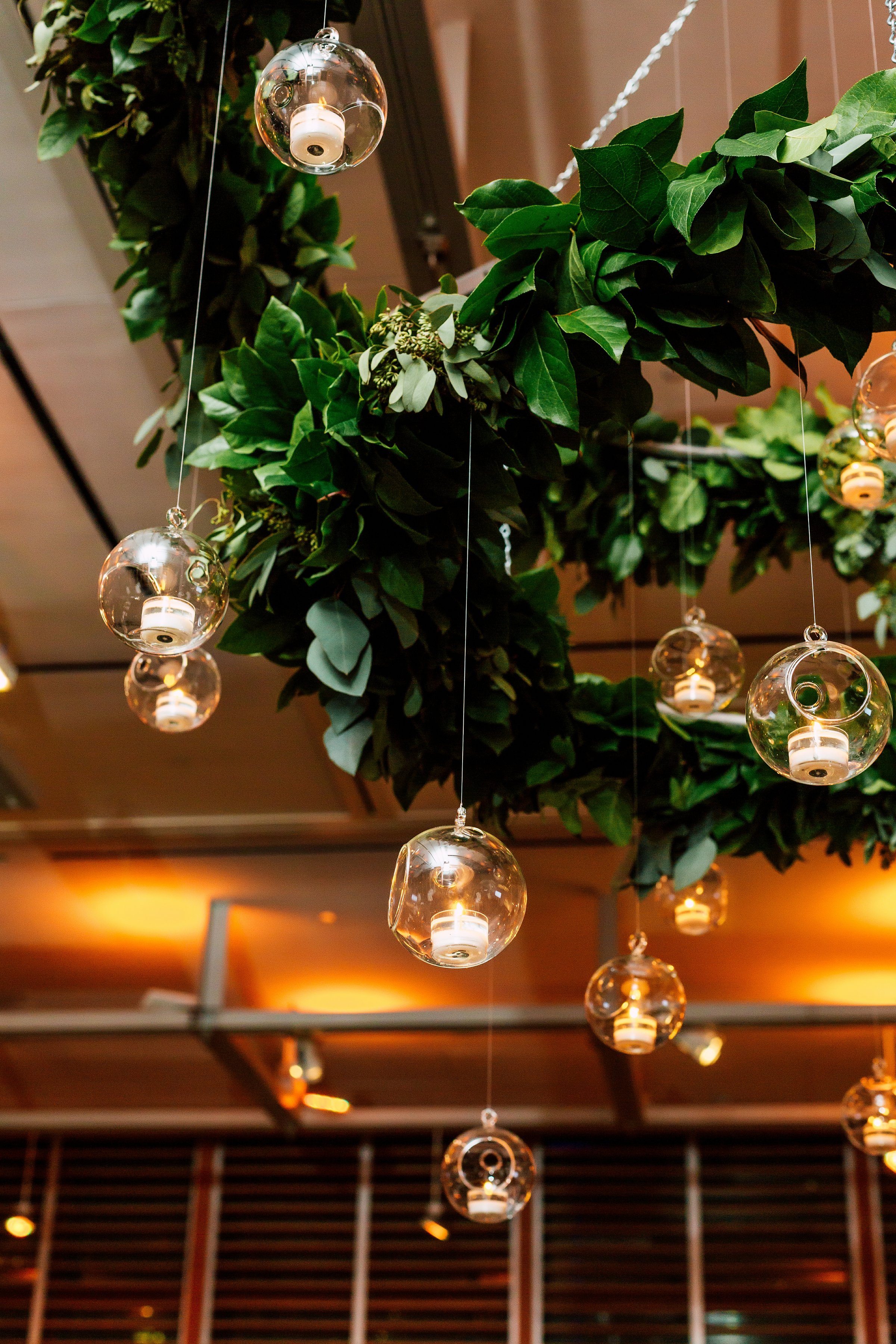 floral-chandelier-event-local-guides-hanging-candles