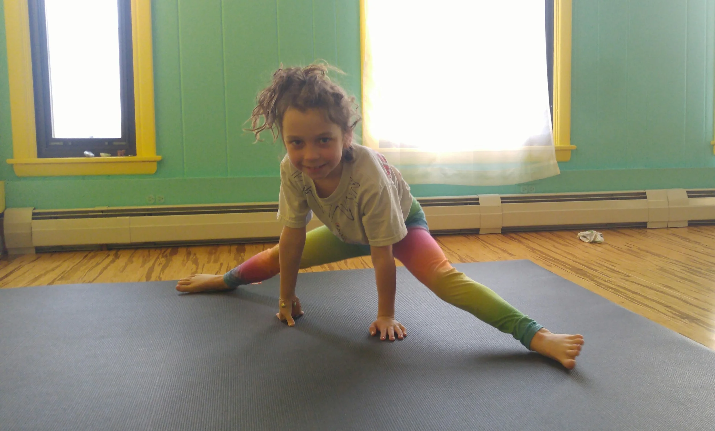 Hunter: age 8, Favorite postures: Headstand, Chakrasana (even though I can’t do it yet)
