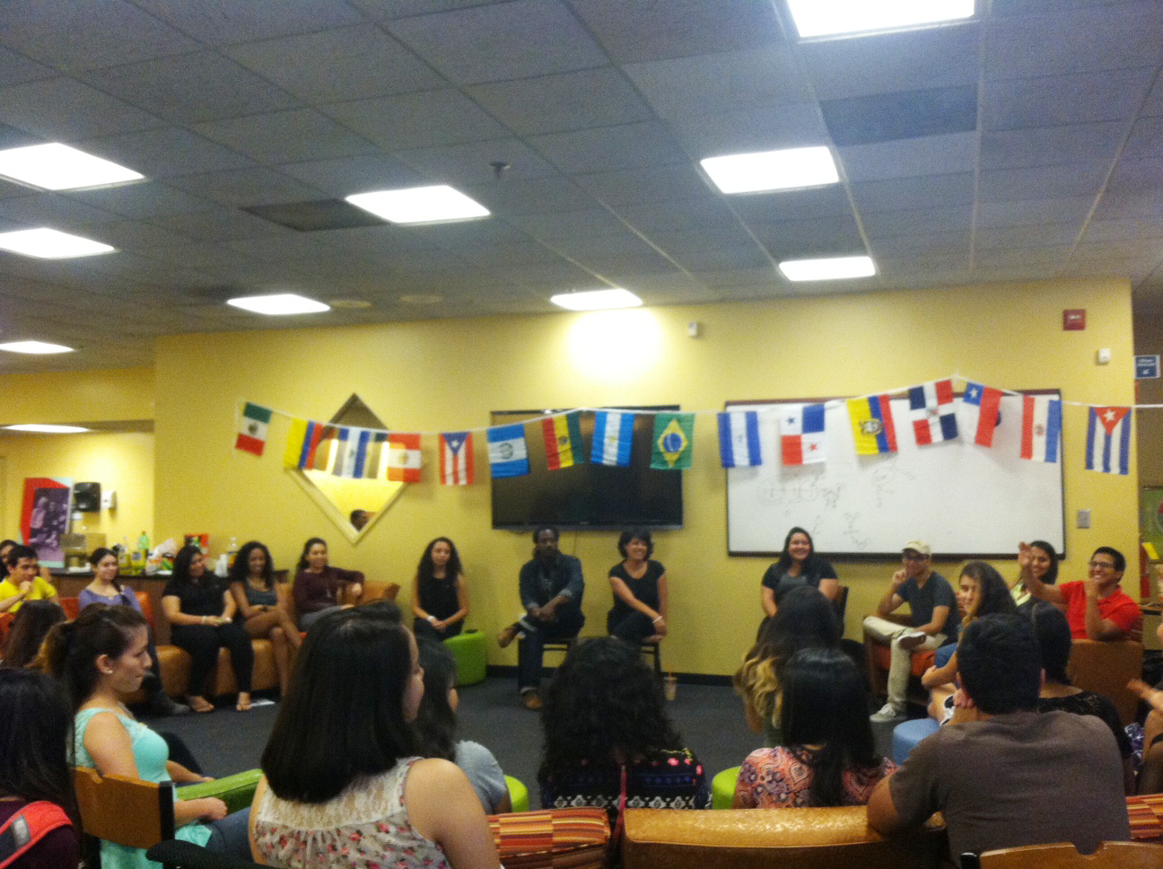 Building Bridges. Carlton Mackey and Natalie Delia lead community discussion reflecting on identity formation in Black and Latino communities at the first annual "50 Shades of Latino" Event.