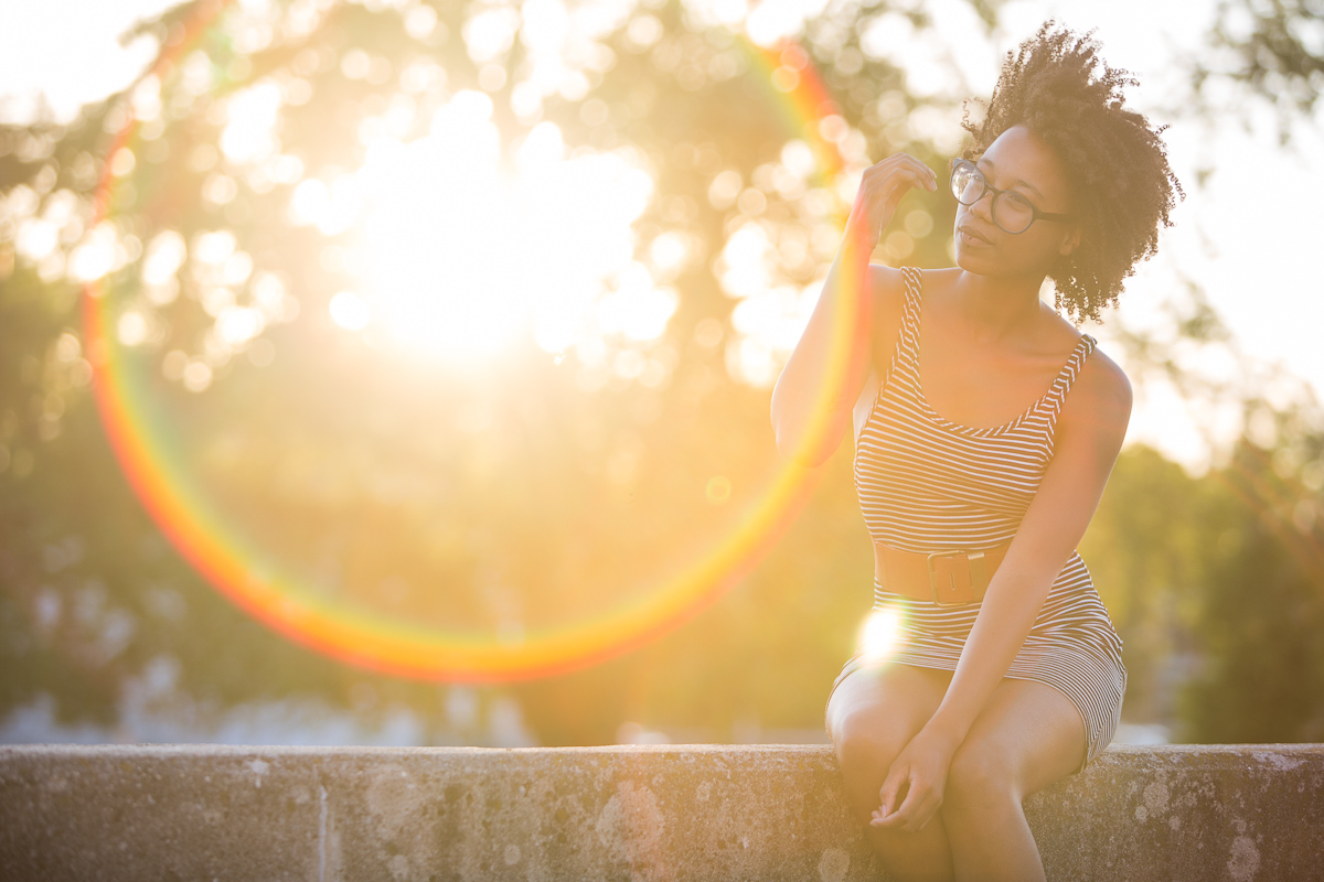 Shooting directly into a light source you can create lens flare. Sometimes this is a problem, but in this case it adds an interesting element to the photograph.