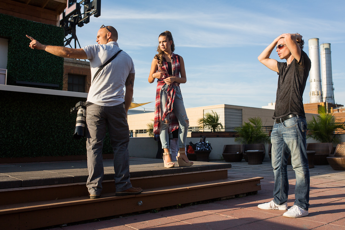 Christian pointing out possible locations to Sofia and Bryce before the shoot.