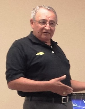 Col. John Telles, Director