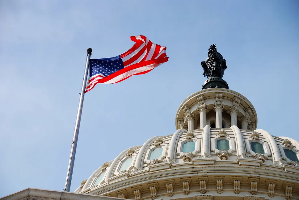 021555372-us-flag-and-capitol-building-w.jpeg