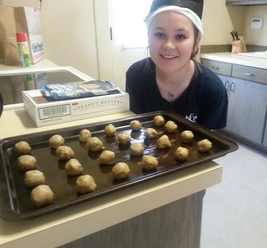 Baking a batch of "yummy" Christmas Cookies