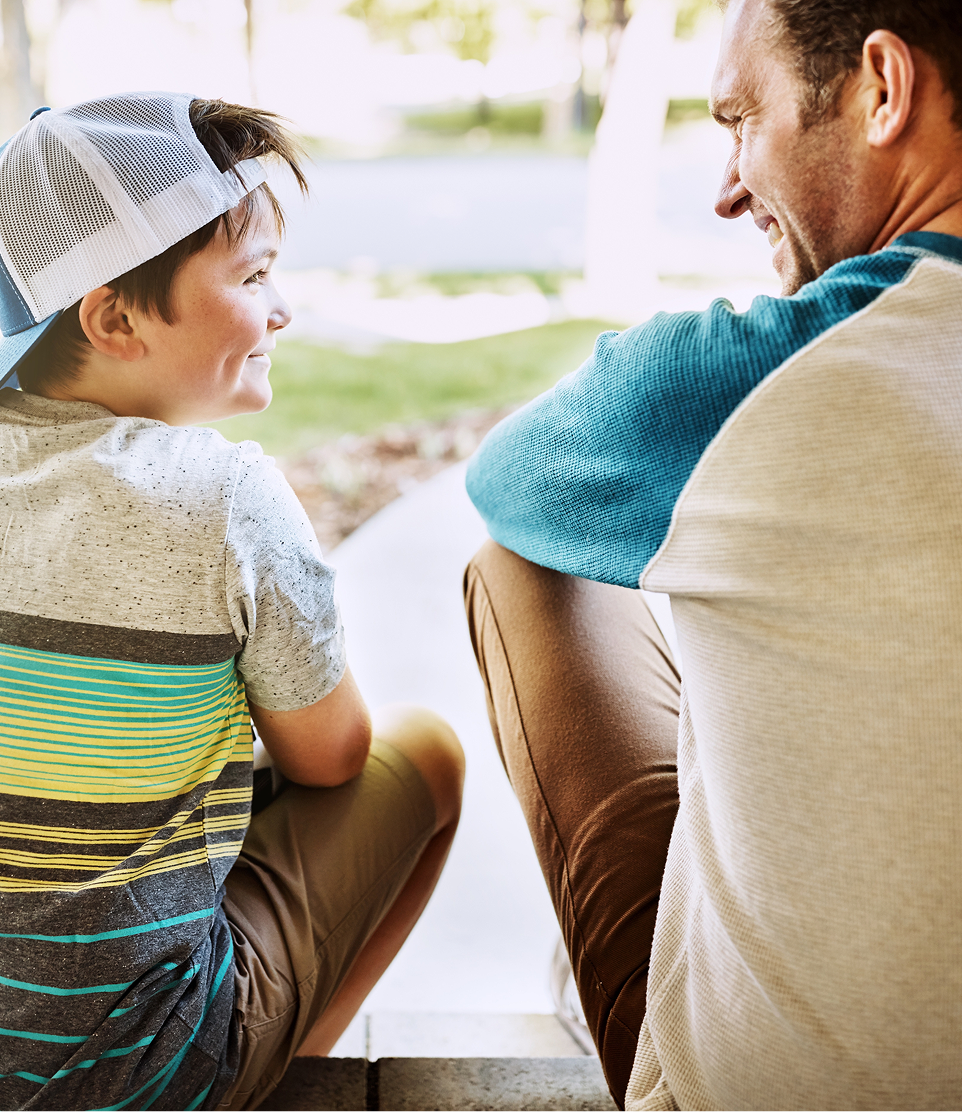 A parent and child together outdoors