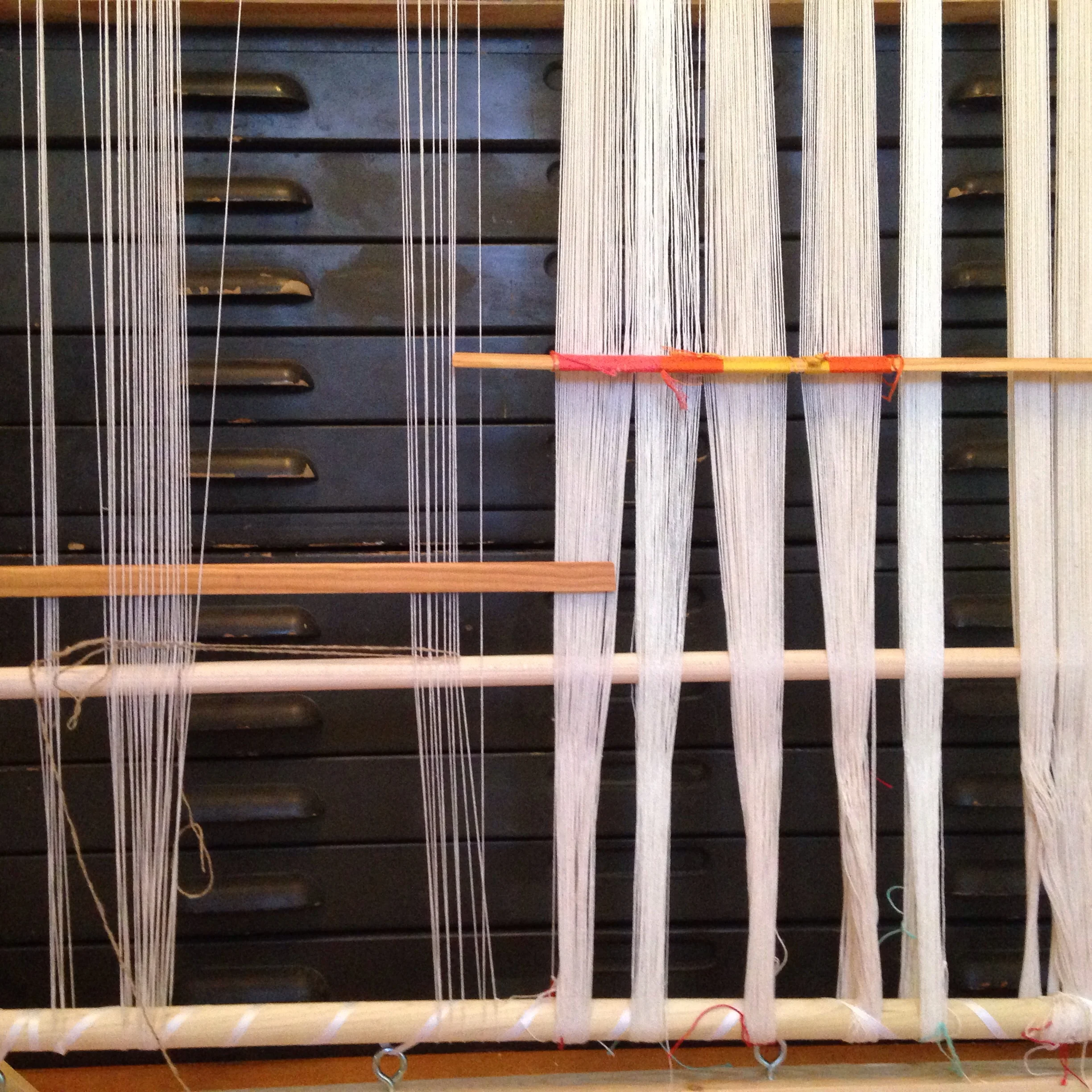 What I learned: the warp on the right, with an intense thread count, is best suited for a floor loom; the warp on the left is better suited for a tapestry loom. 