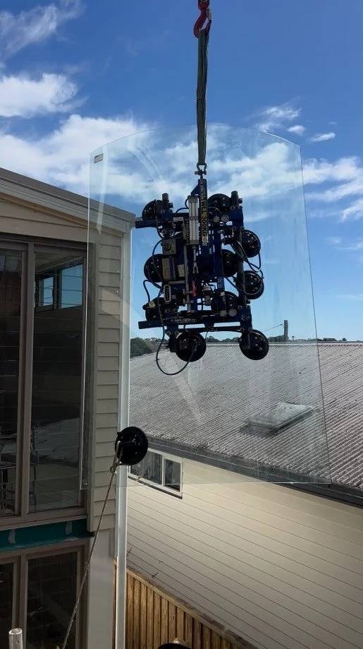 curved glass window on crane