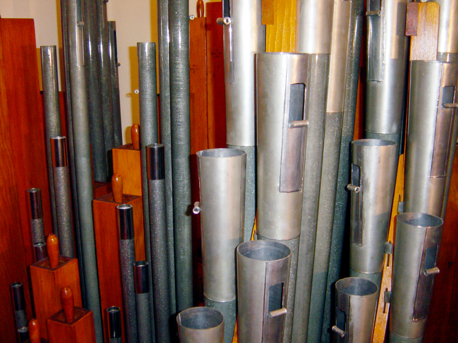 new tuning scroll inserts on reed pipes.jpg