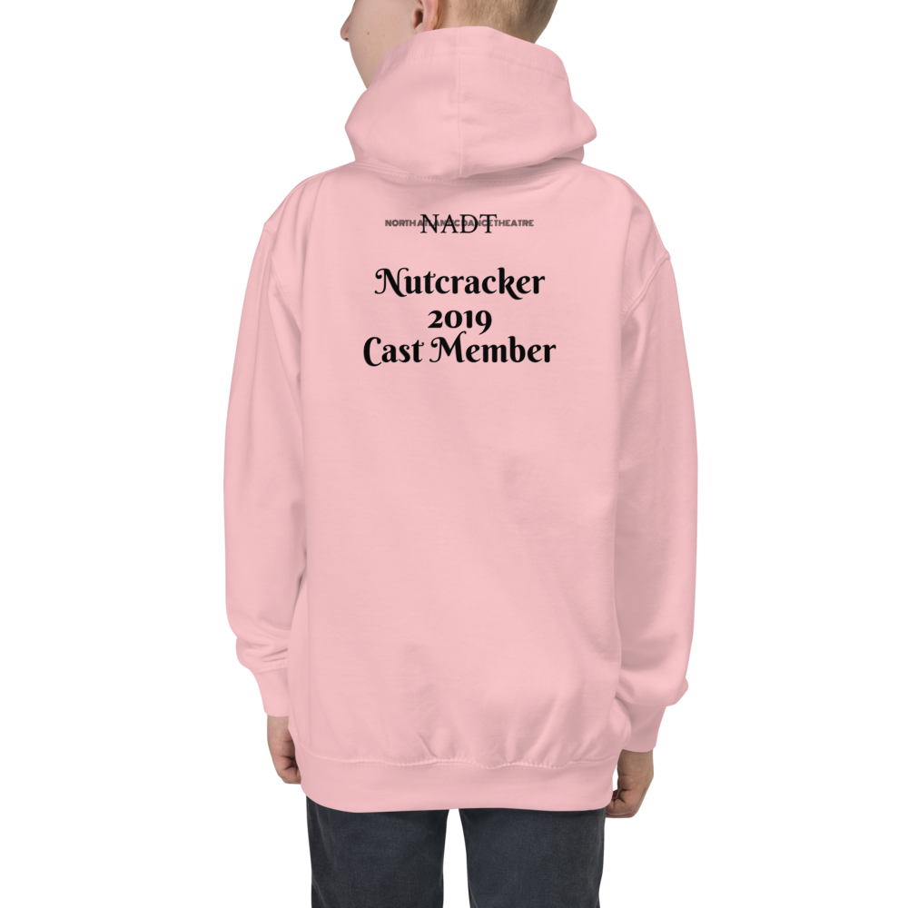 nutcracker.mouse-and-nut-doll.tshirt_NADTsquarespace-logo-black_printfile_f_mockup_Back_Boys_Baby-Pink.png