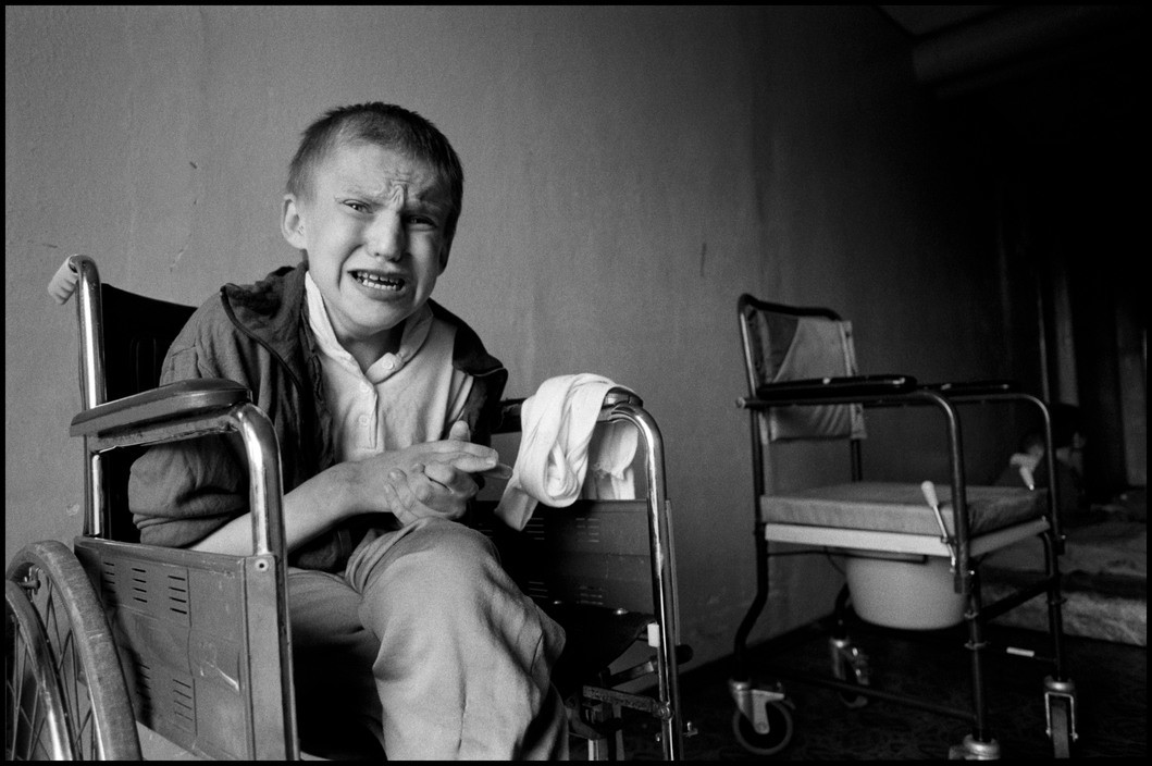  BELARUS. 1997. Novinki Asylum, Minsk. This boy seems to live in a constant state of terror.
� Paul Fusco/Magnum Photos 